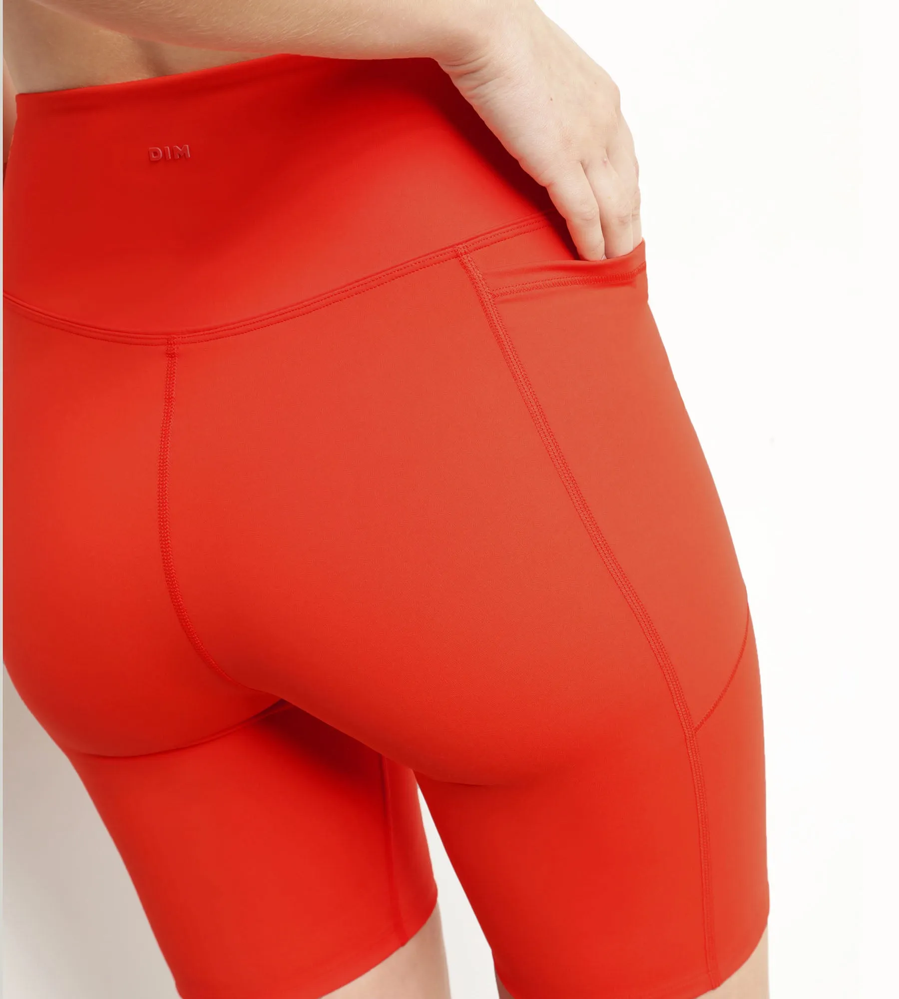Women's sports cyclist in orange sculpting microfibre Dim Move