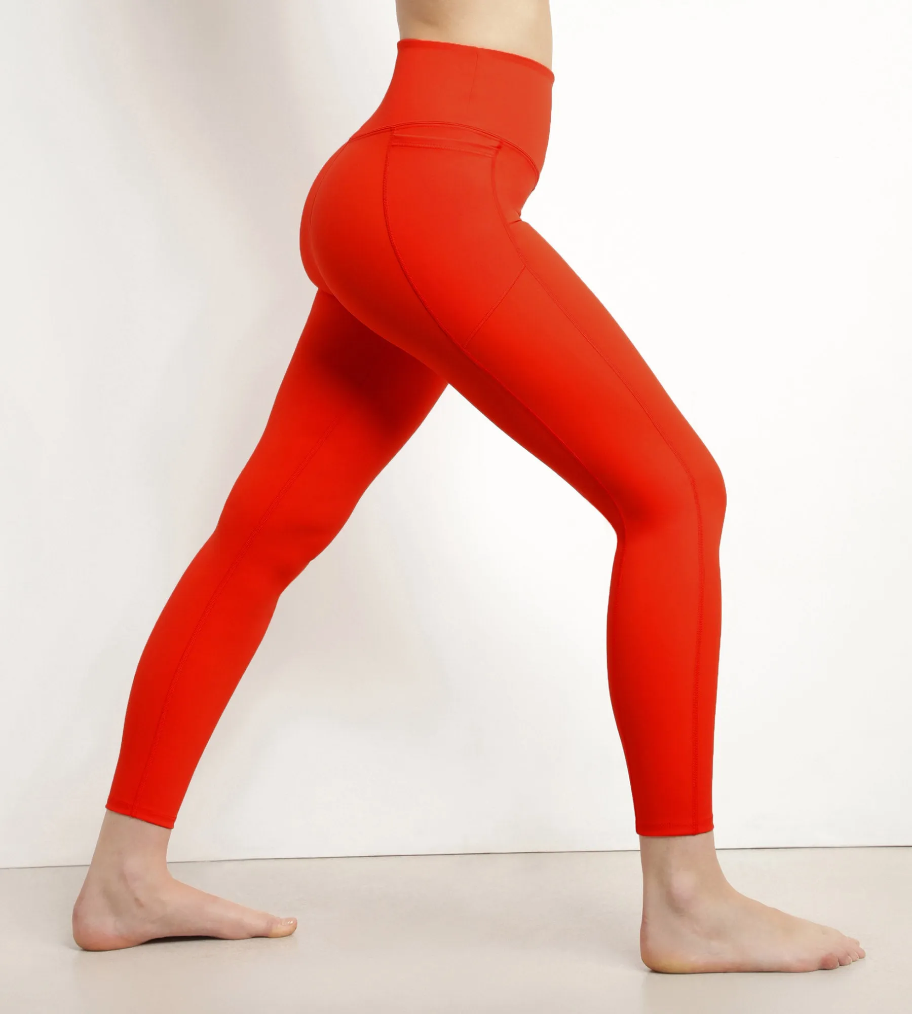 Women's sports leggings in orange sculpting microfibre Dim Move